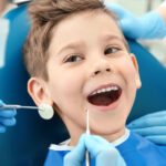 What are the causes and cures of a gummy smile?